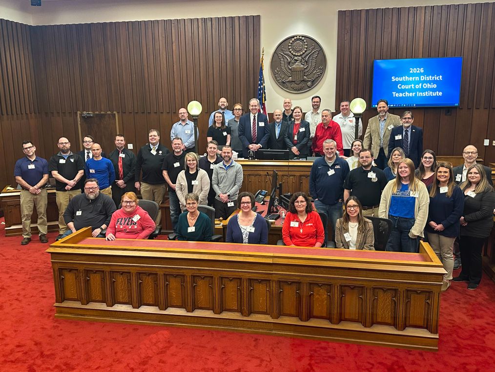 Teachers at the 2026 U.S. District Court Teachers’ Institute in Dayton pose with Judges Newman, Silvain and Gentry.